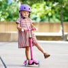 Micro-Mini-Deluxe-2-Magic-Scooter-Pink-In-Use